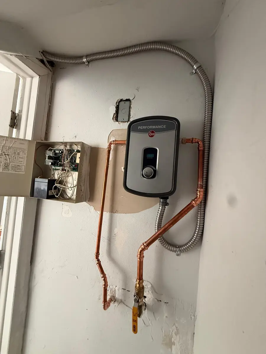 Tankless water heater installed with new copper piping
